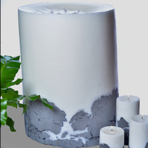 The BFG by Africandle. 400mm by 600mm, multi wick pillar candle set in a concrete base.