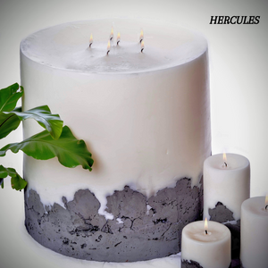 The Hercules by Africandle. 400mm by 450mm, multi wick pillar candle set in a concrete base.